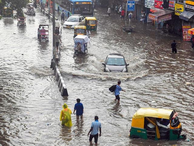 *Flooded urban road during monsoon* – The Problem &amp; The Solution